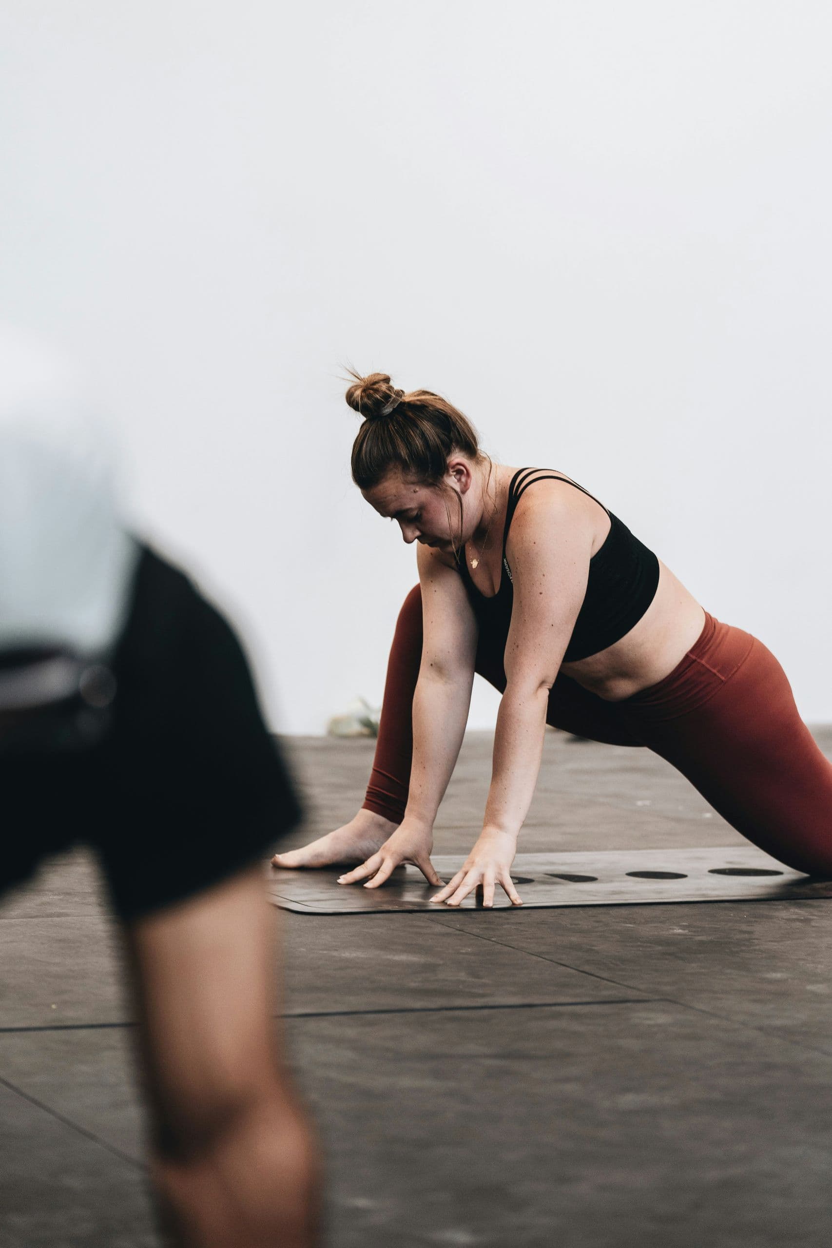 Woman stretching on the floor